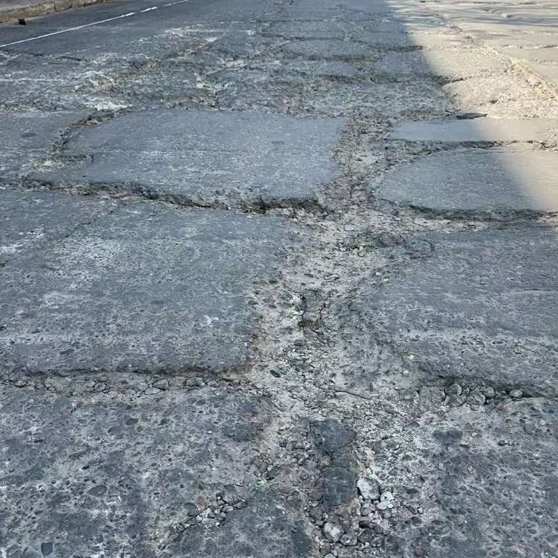 丹棱路面起砂露石子修补料